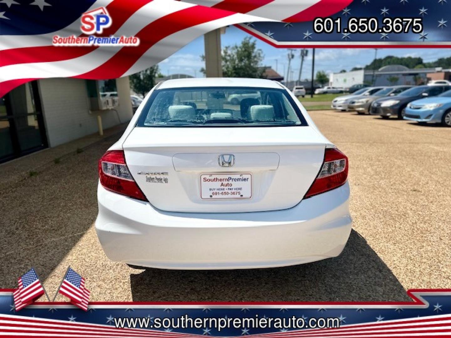 2012 WHITE HONDA CIVIC LX LX (2HGFB2F51CH) with an 1.8L L4 SOHC 16V engine, 5-Speed Automatic transmission, located at 922 W. Beacon St., Philadelphia, MS, 39350, (601) 650-3675, 32.770447, -89.127151 - Title: 2012 Honda Civic LX Sedan Year: 2012 Make: Honda Model: Civic Engine: 1.8L L4 SOHC 16V Body: SEDAN 4-DR Transmission: 5-Speed Automatic Drive Type: FWD Mpg City: 28 Mpg: 39 Trim: LX Sedan - Photo#4